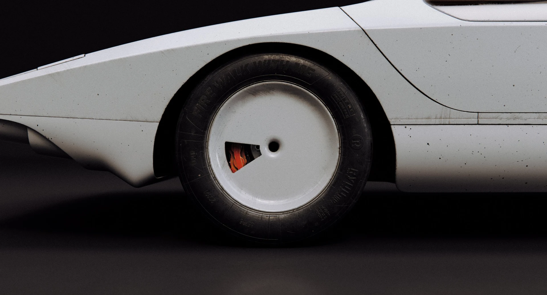 CALIBAN — carabo_car-white_001_studio_tire_DARK